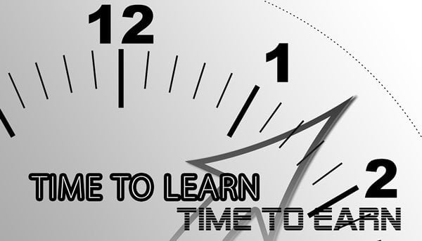 part of a clock face representing it is time to learn and earn